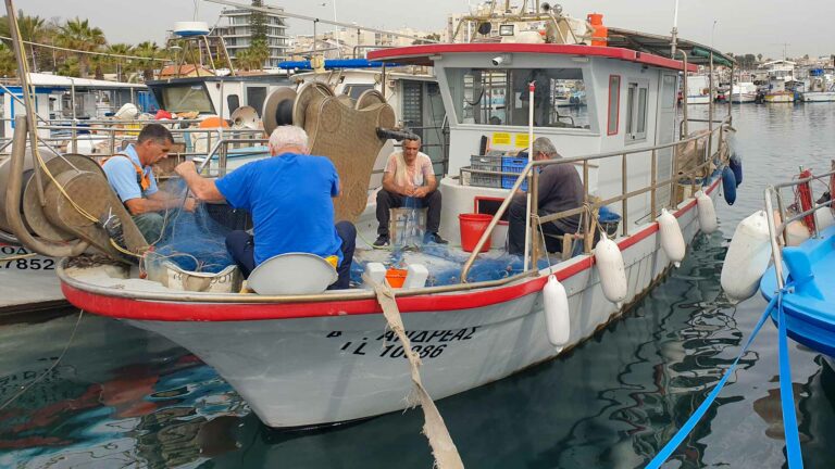 fishers-working-fishing-shelter-cyprus-larnaca
